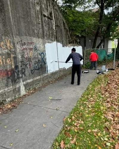 UCAN, business owner provide manpower to clean graffiti on Harrison Street